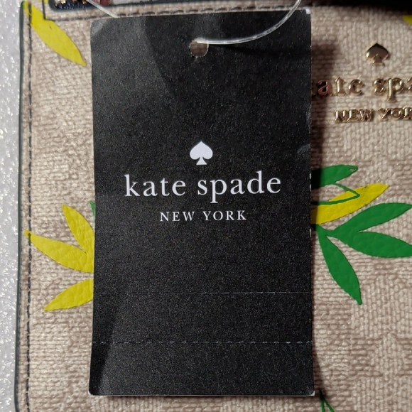 Kate Spade Beige Wristlet with Blue and Yellow Floral Design NWT